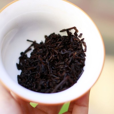 批发云南普洱茶叶朗河壹品金芽茶皇料熟茶一口料357g七子饼图3